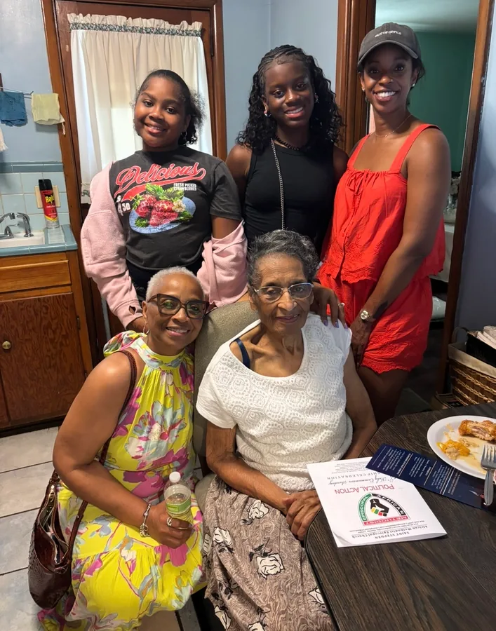 Generations of Edwards women together in a family kitchen.